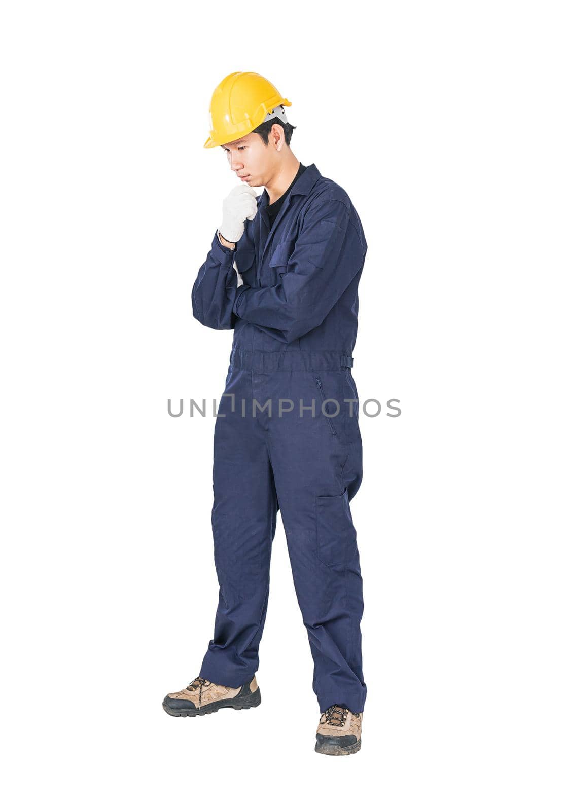 Workman with blue coveralls and hardhat in a uniform with clipping path by stoonn