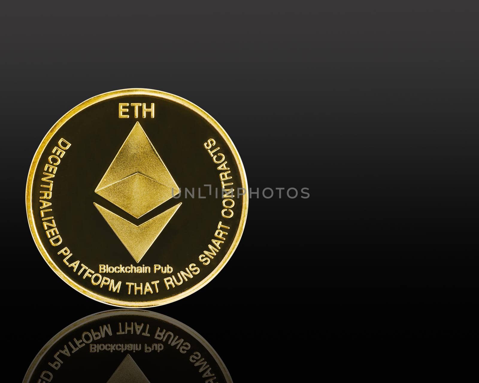 Close up golden ethereum symbol isolated on black background