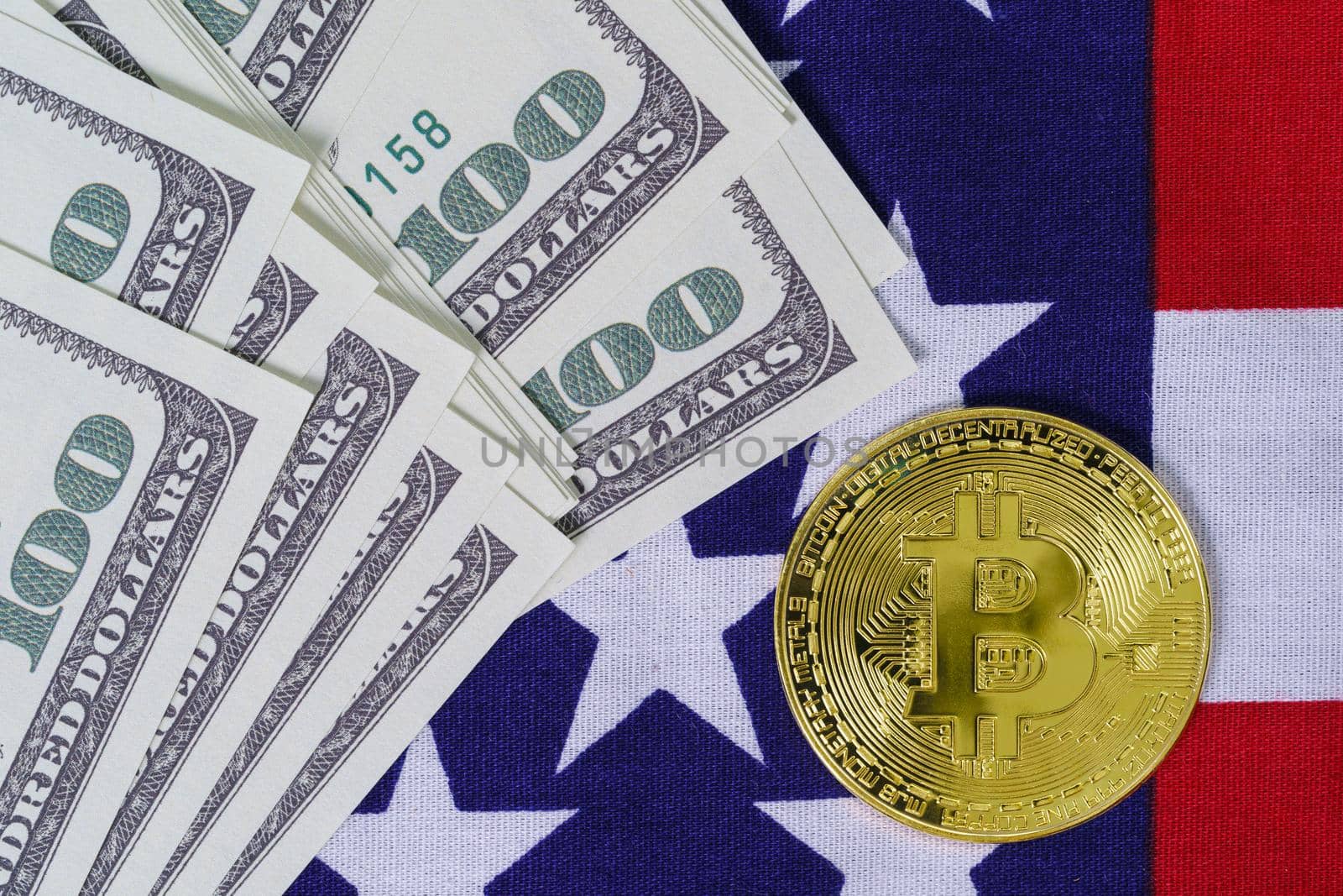 Gold Bitcoin coin and banknote on usa flag  by stoonn