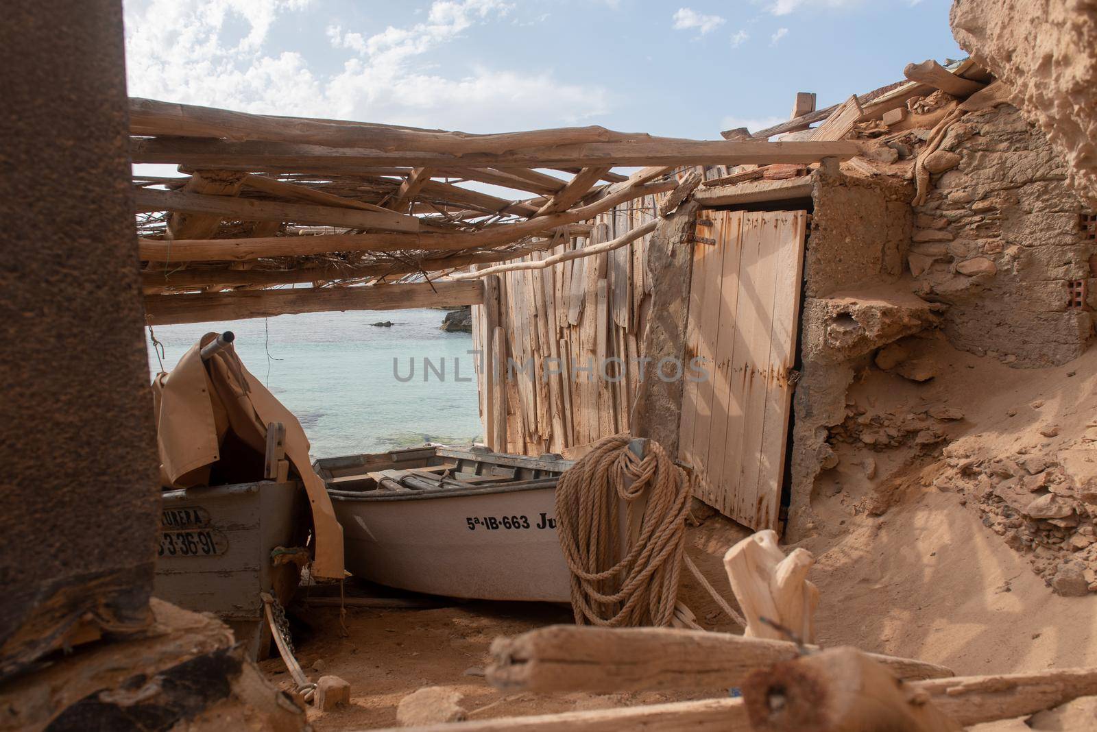 Formentera, Spain : 2021 June 04 : Boat in Formentera beach of Calo d es Mort in Balearic Islands in summer 2021