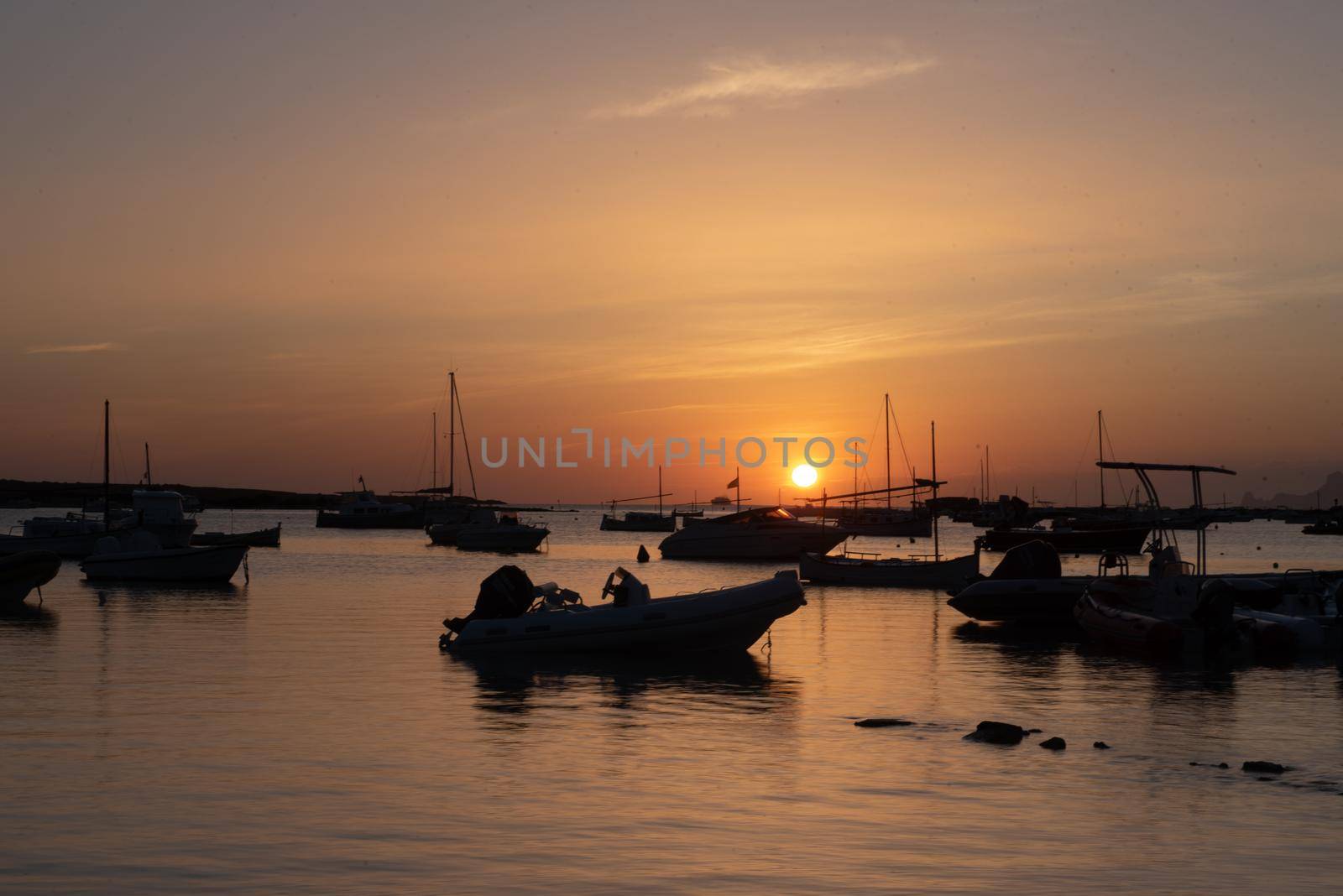 Sunset in the Estany d Es Peix in Formentera, Spain.