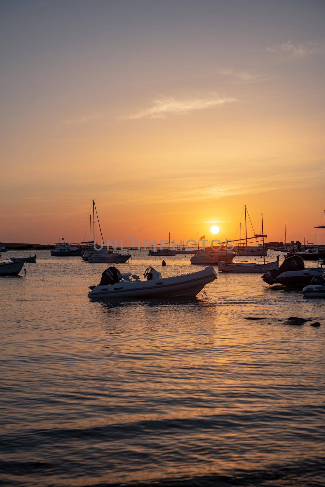 Sunset in the Estany d Es Peix in Formentera, Spain.