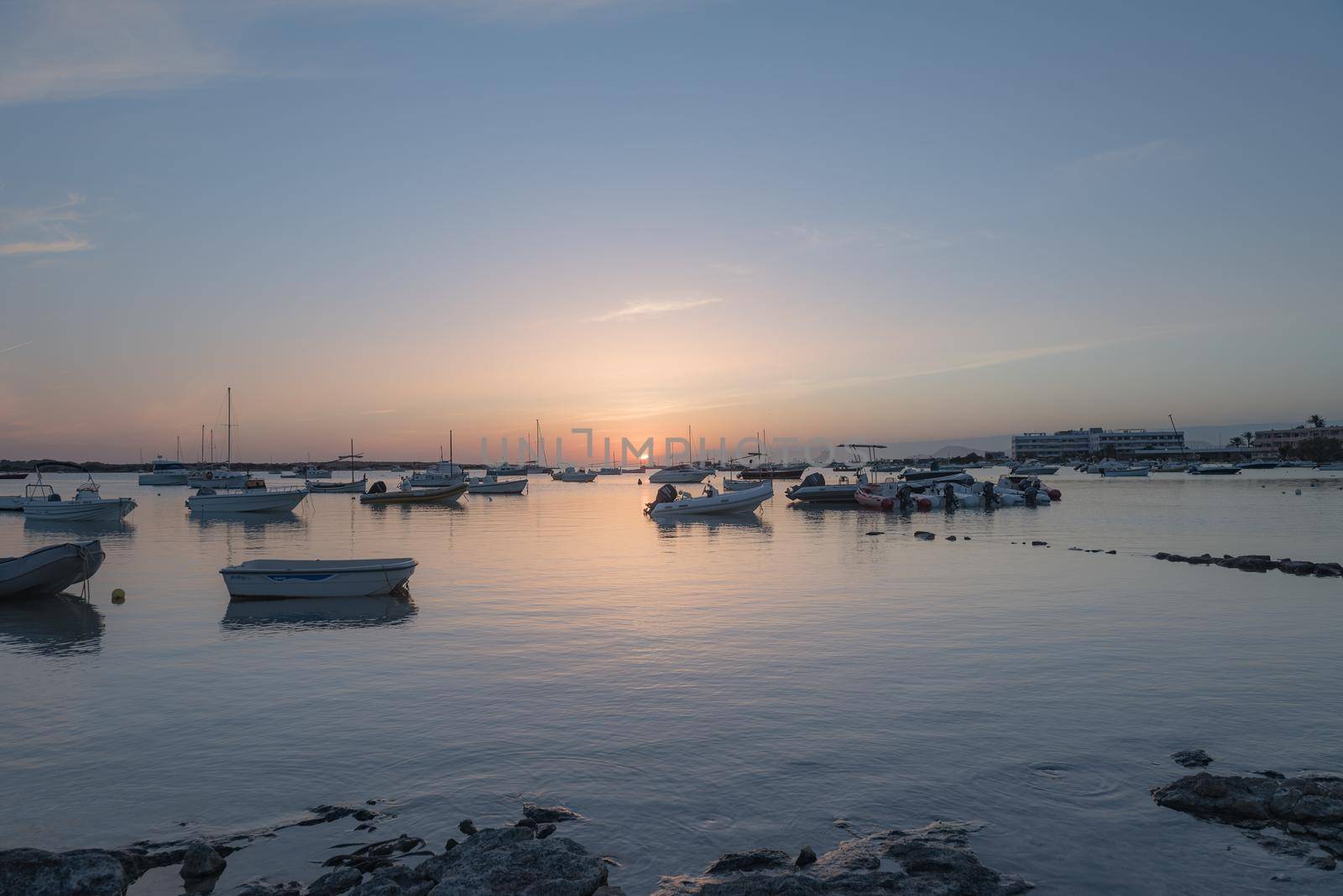 Sunset in the Estany d Es Peix in Formentera, Spain.