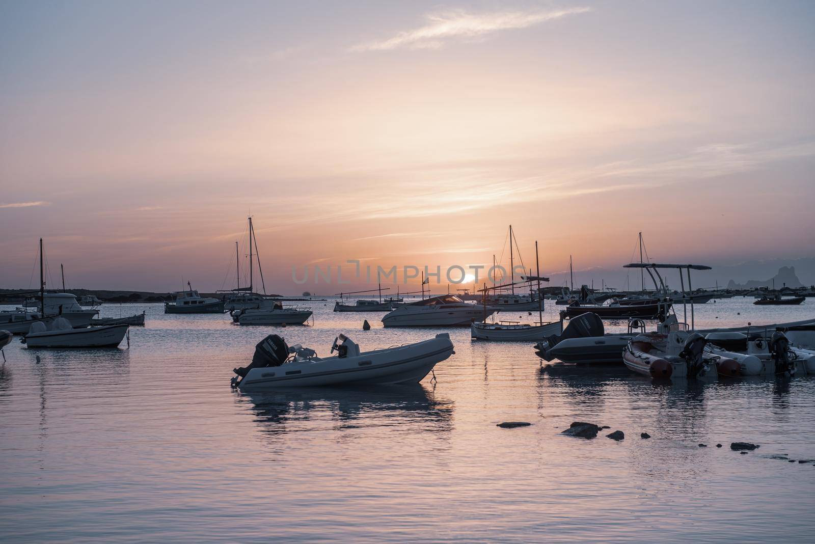 Sunset in the Estany d Es Peix in Formentera, Spain.