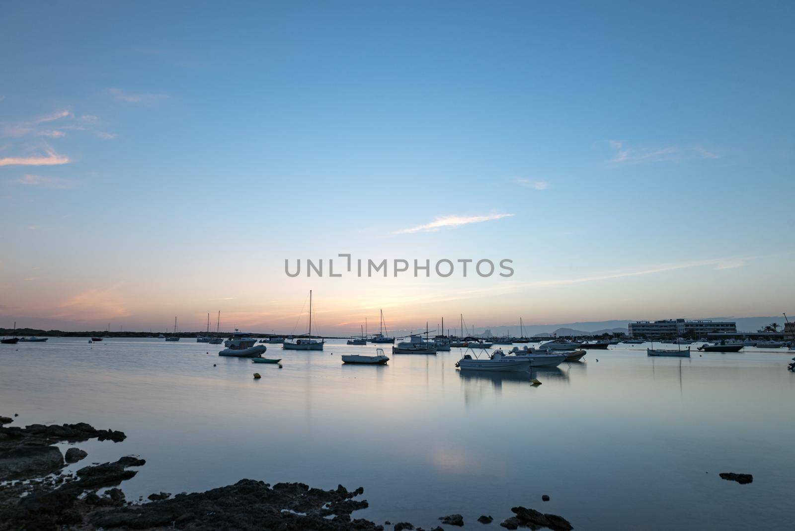 Sunset in the Estany d Es Peix in Formentera, Spain.