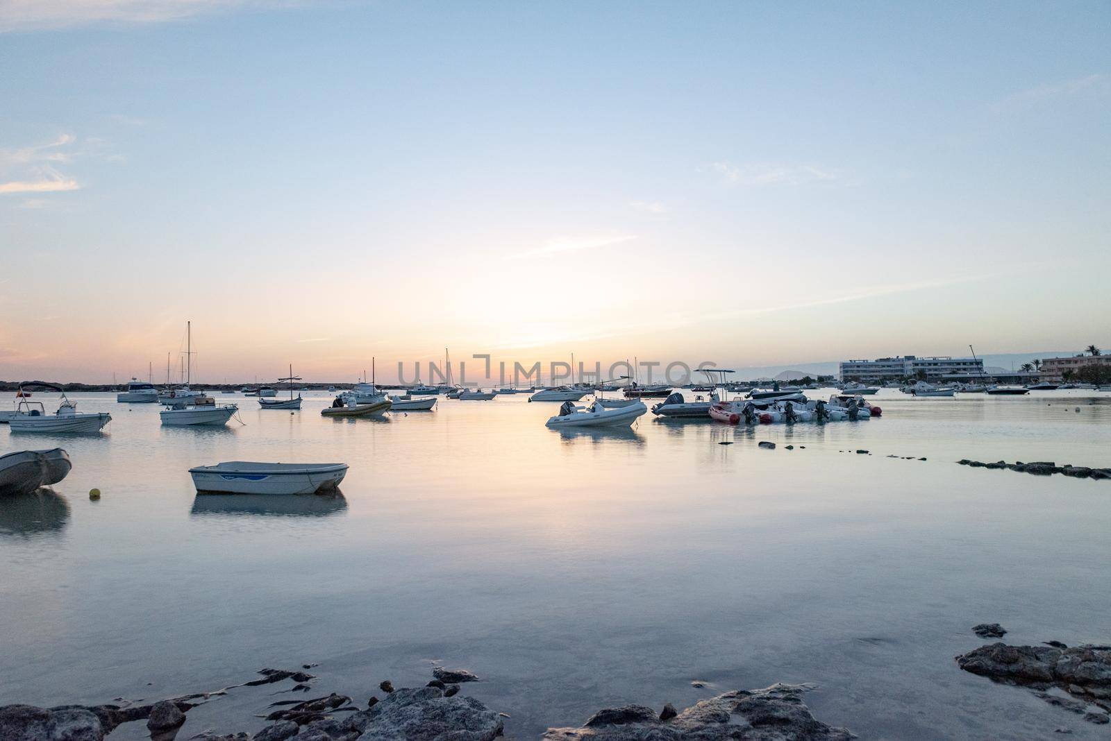 Sunset in the Estany d Es Peix in Formentera, Spain.