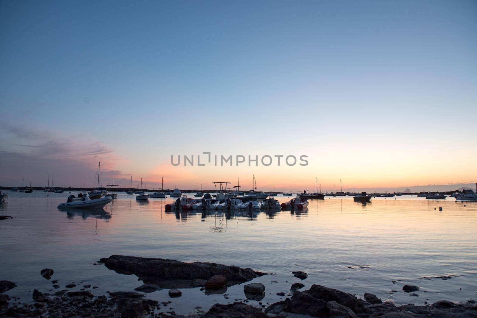 Sunset in the Estany d Es Peix in Formentera, Spain.