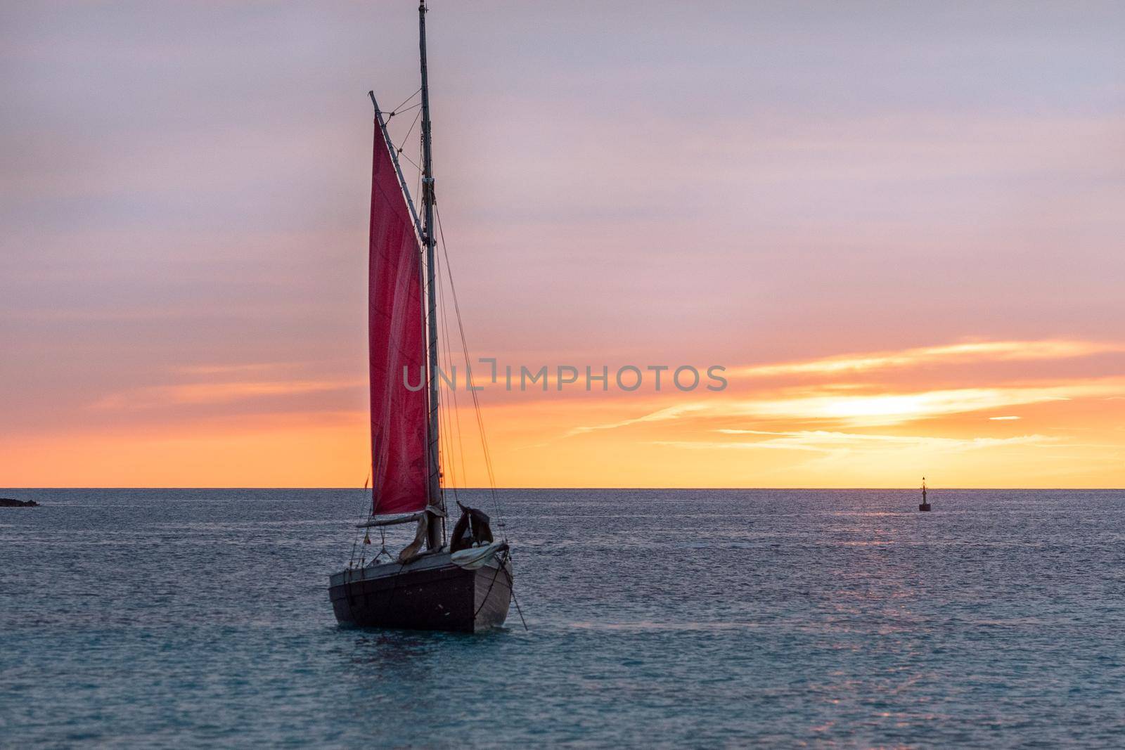 Sailing boat on the Island of Formentera in the summer of 2021 with Es Vedra behind.