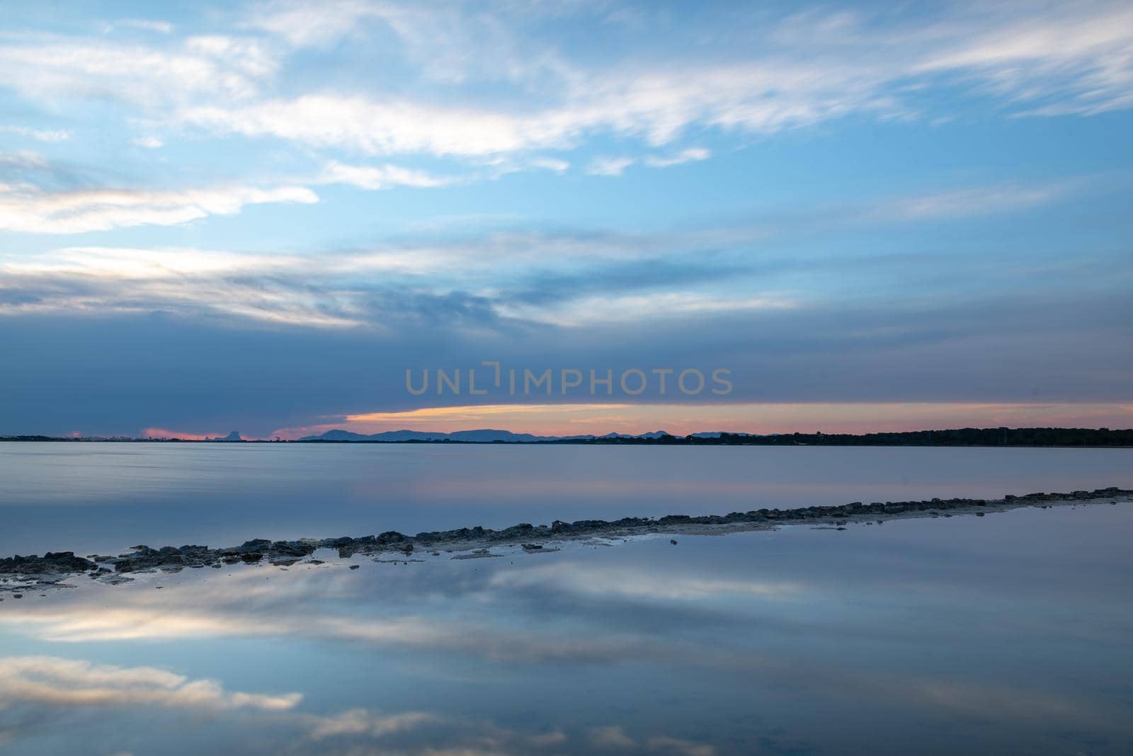 Sunset at the Estany Pudent in the Ses Salines Natural Park in Formentera, Spain.