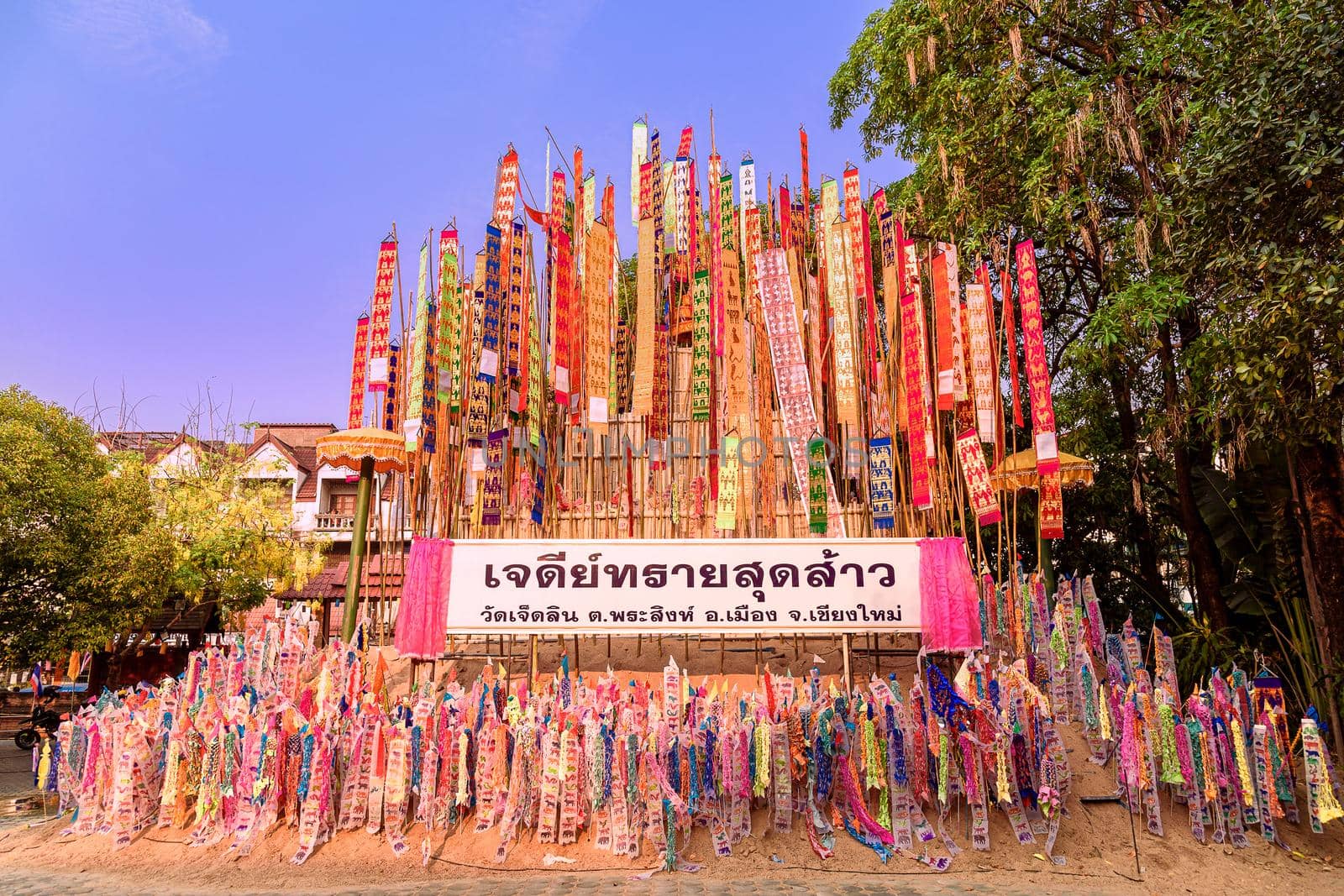 Paper flag on the pile of sand or Sand pagoda in Songkran festival at Jedlin Temple located in Muang, Chiang Mai, Thailand.  A Believe of people in the deceased relative to Paradise.