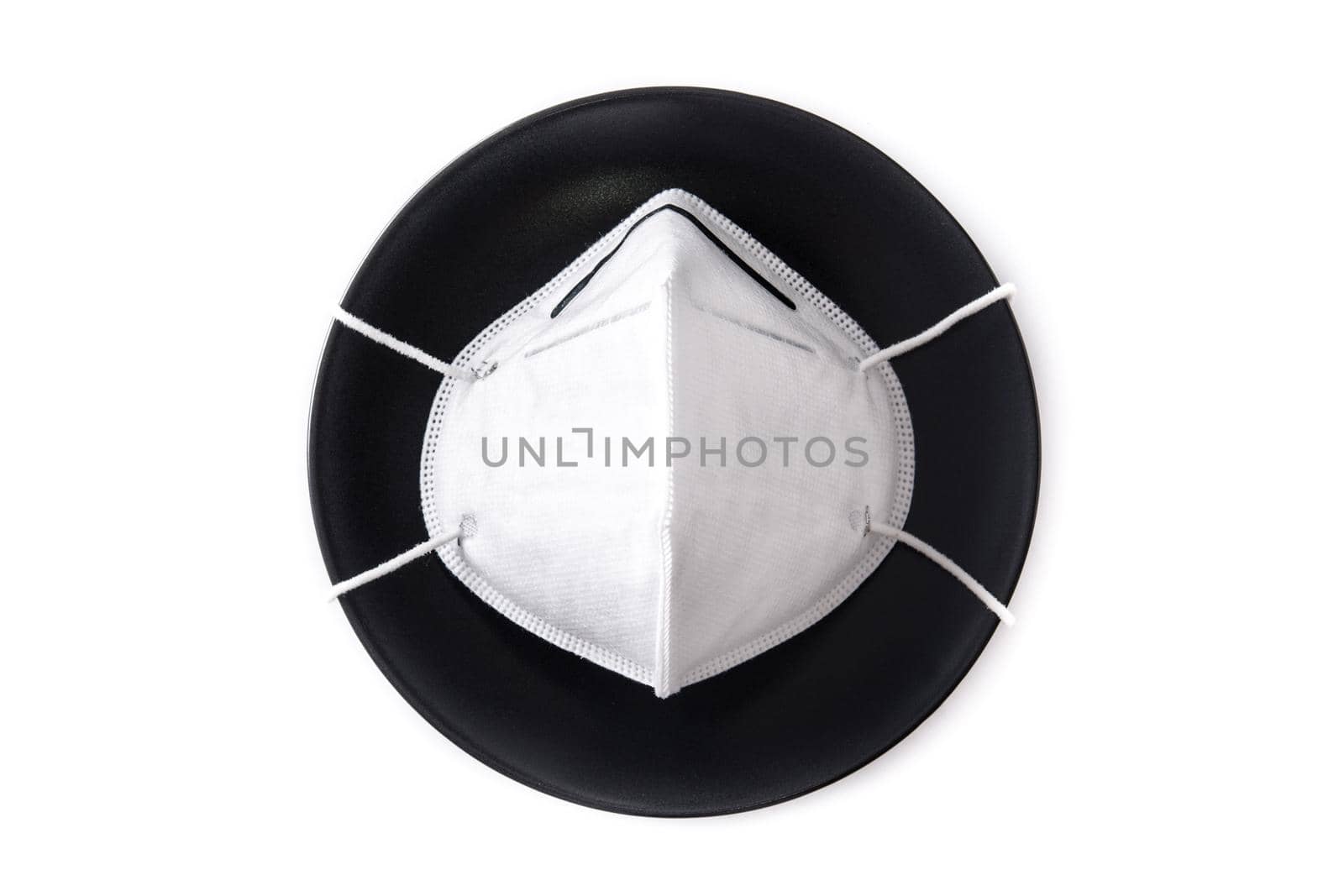 Protective face mask on a black plate by chandlervid85