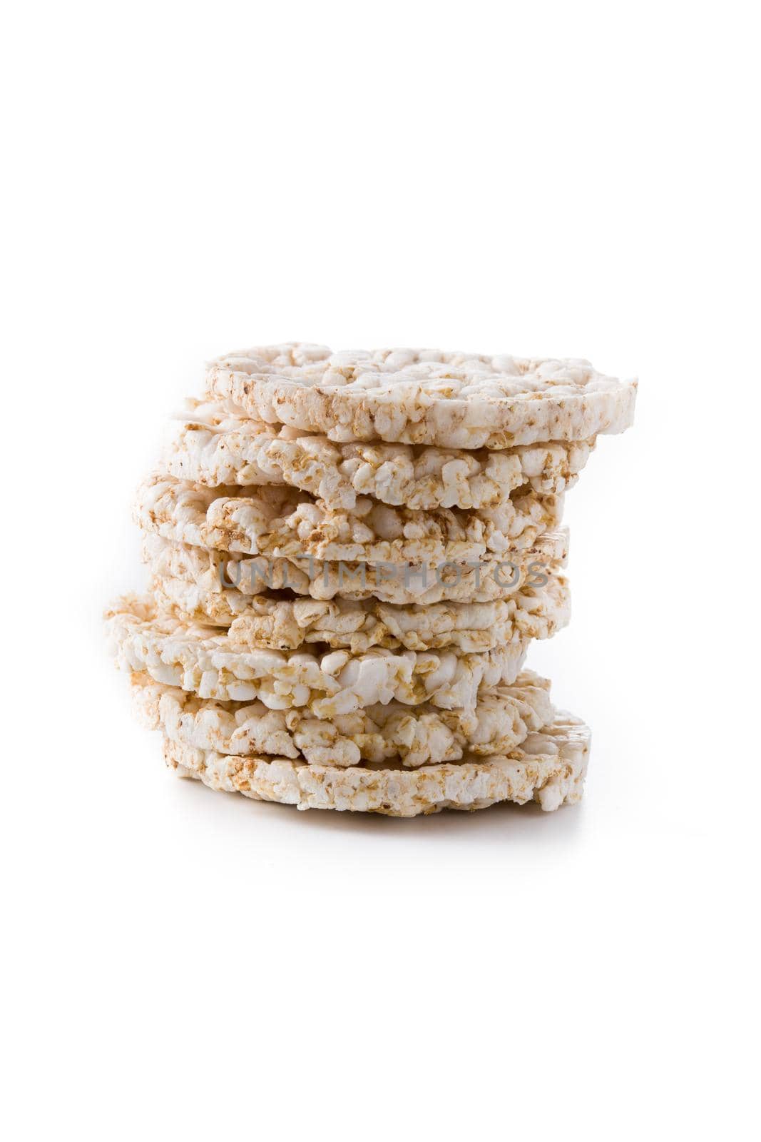 Pile of puffed rice cakes isolated on white background