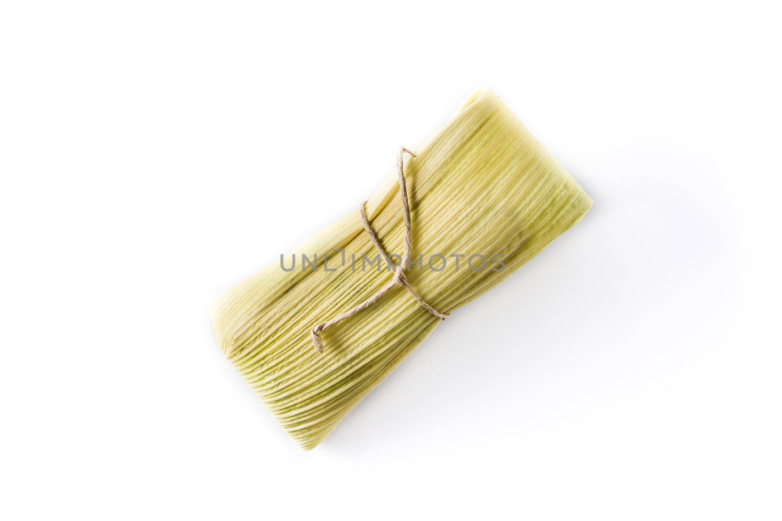 Mexican corn and chicken tamales isolated on white background.