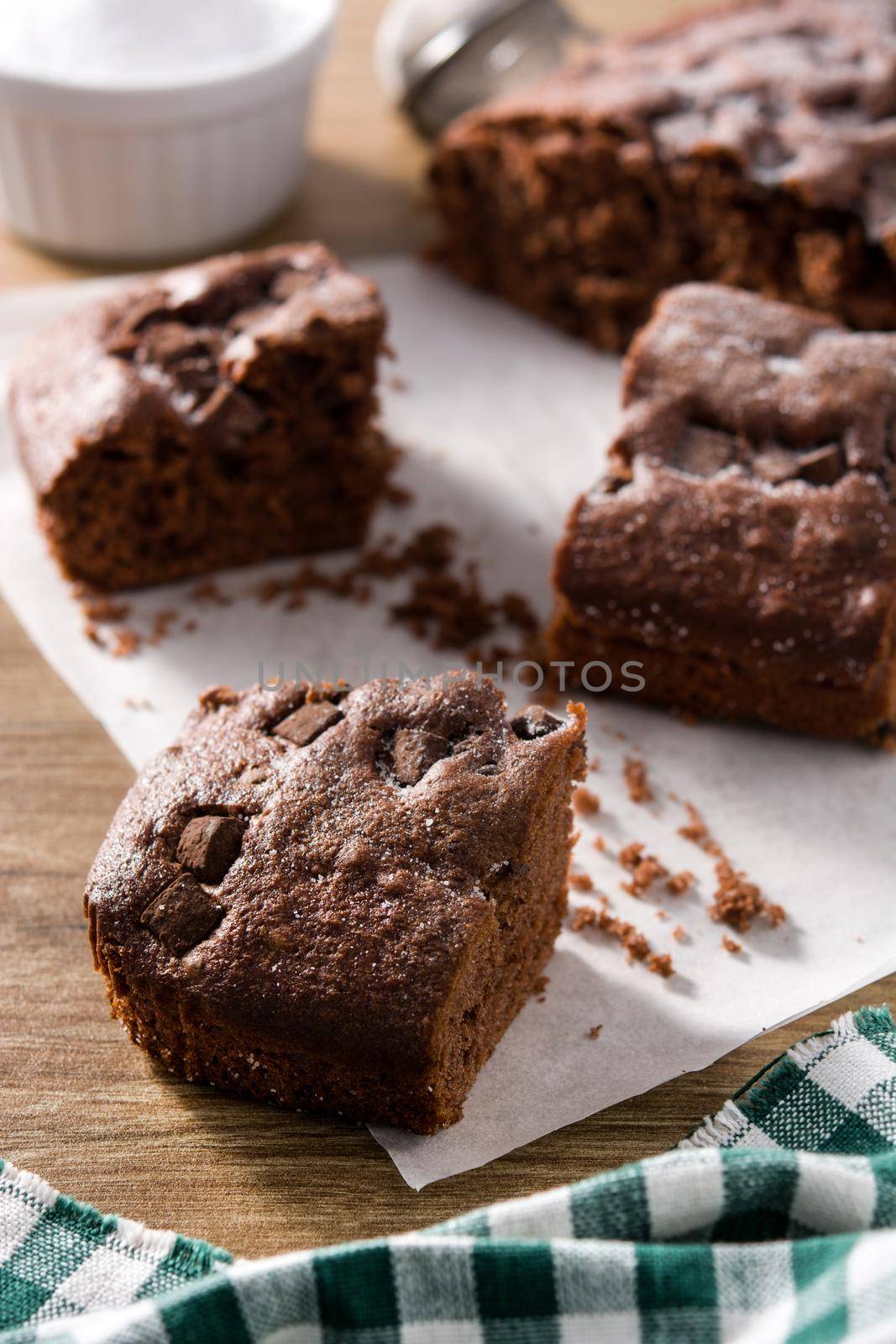 Delicious chocolate cake on wooden table