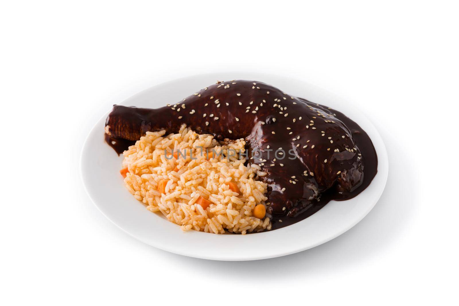 Traditional mole Poblano with rice isolated on white background