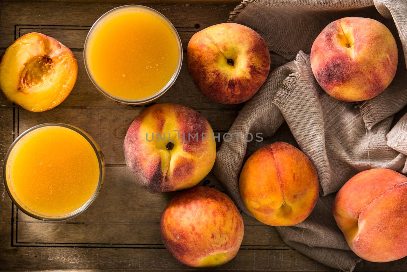 Natural peach juice in glass by chandlervid85