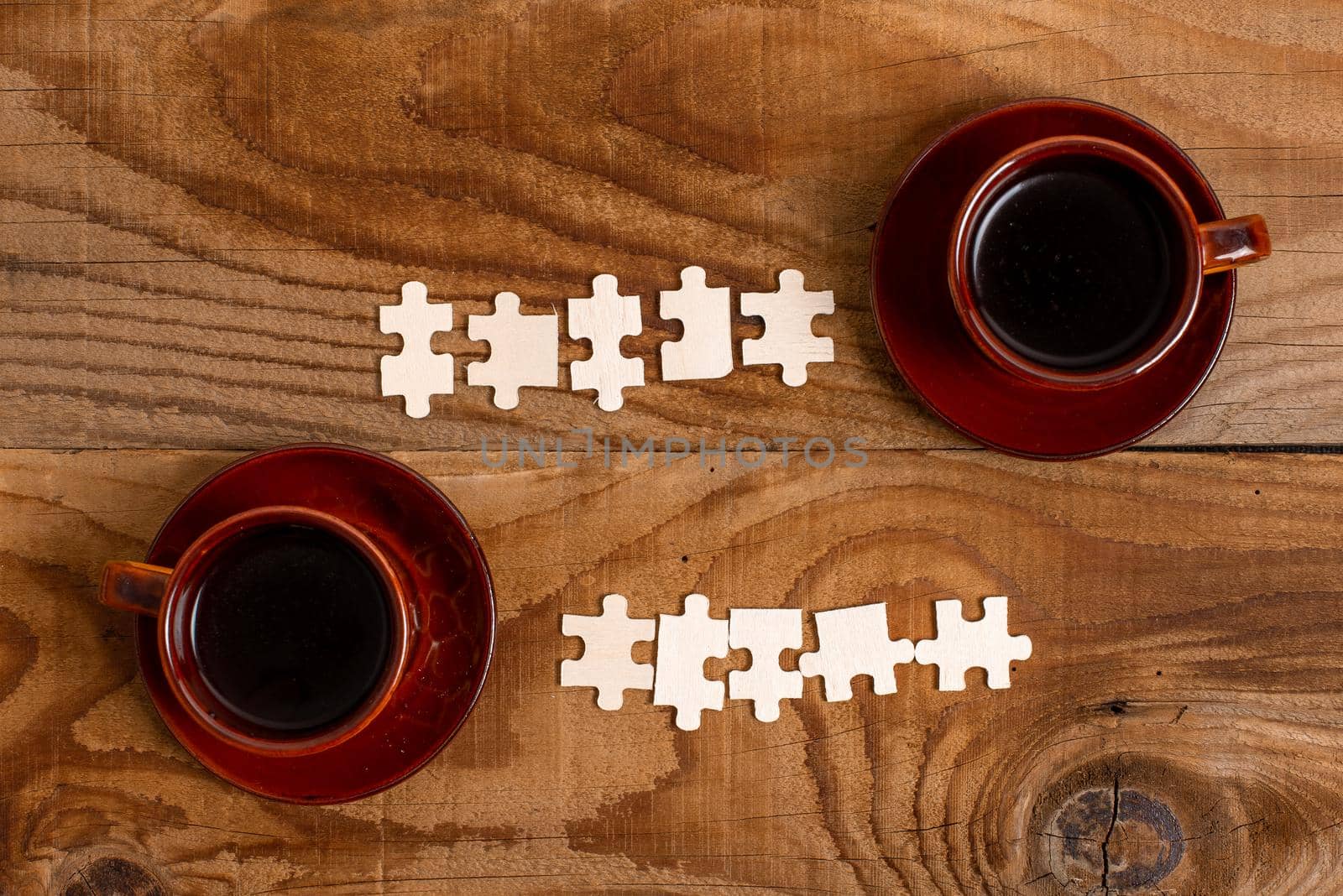Building An Unfinished White Jigsaw Pattern Puzzle With Missing Last Piece