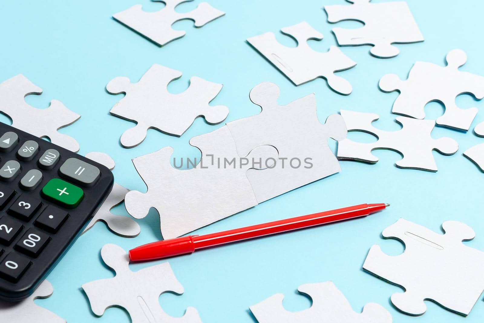 Building An Unfinished White Jigsaw Pattern Puzzle With Missing Last Piece
