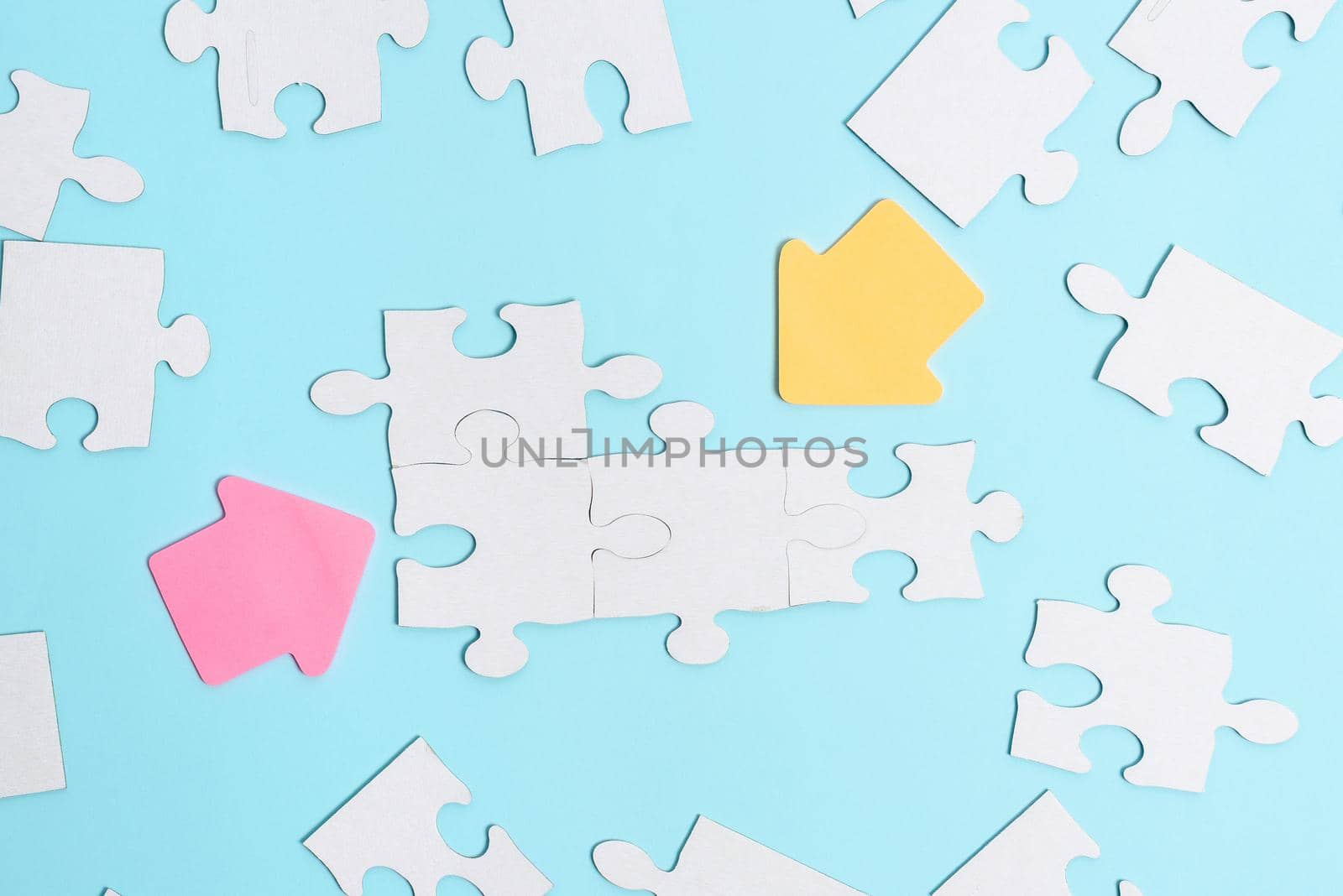 Building An Unfinished White Jigsaw Pattern Puzzle With Missing Last Piece