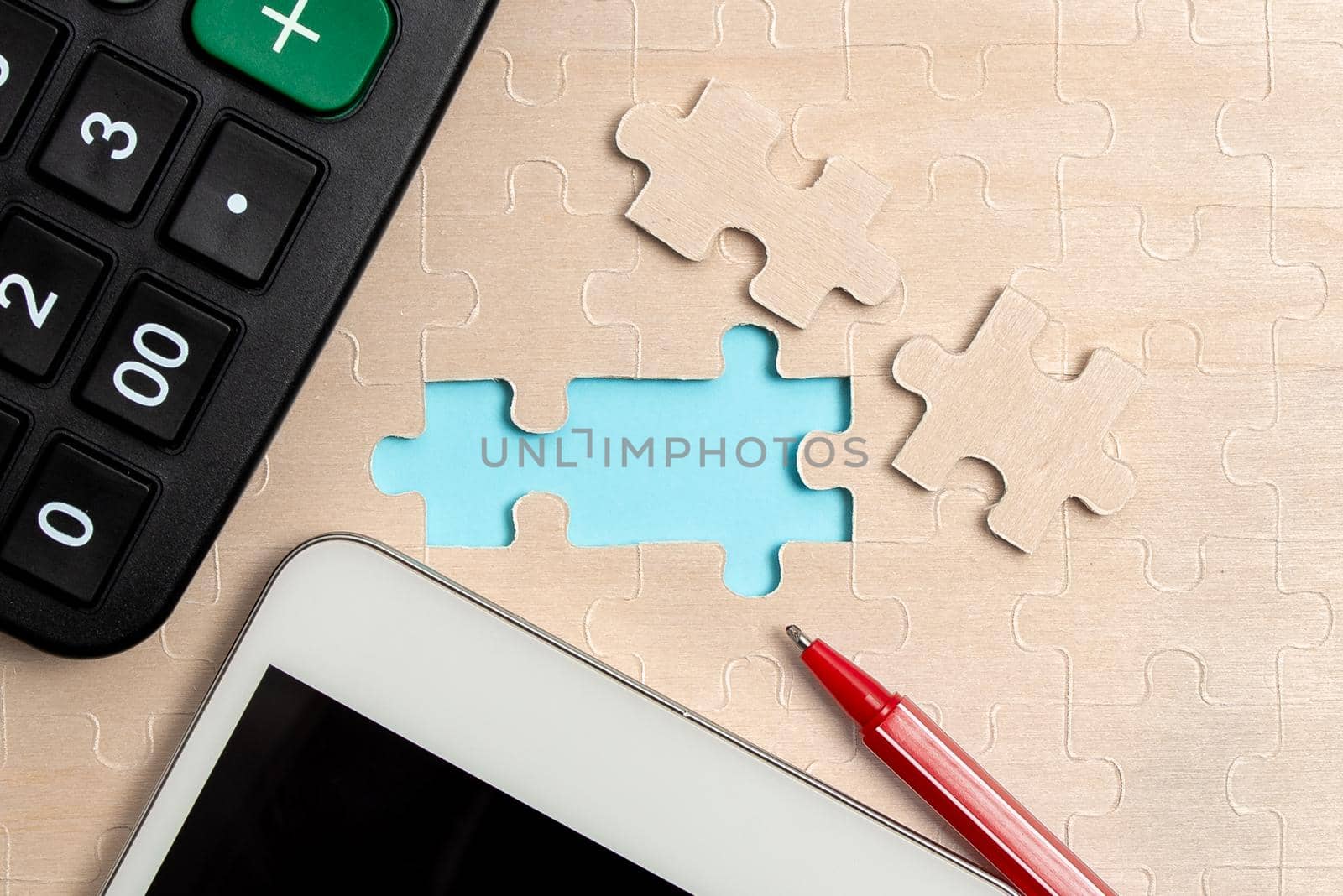 Building An Unfinished White Jigsaw Pattern Puzzle With Missing Last Piece