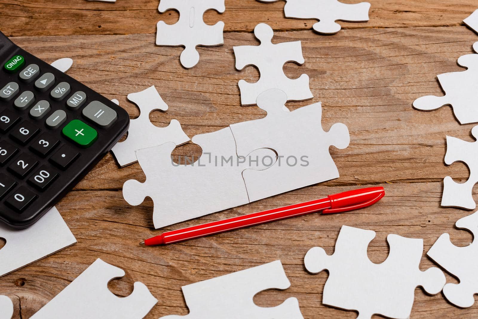 Building An Unfinished White Jigsaw Pattern Puzzle With Missing Last Piece