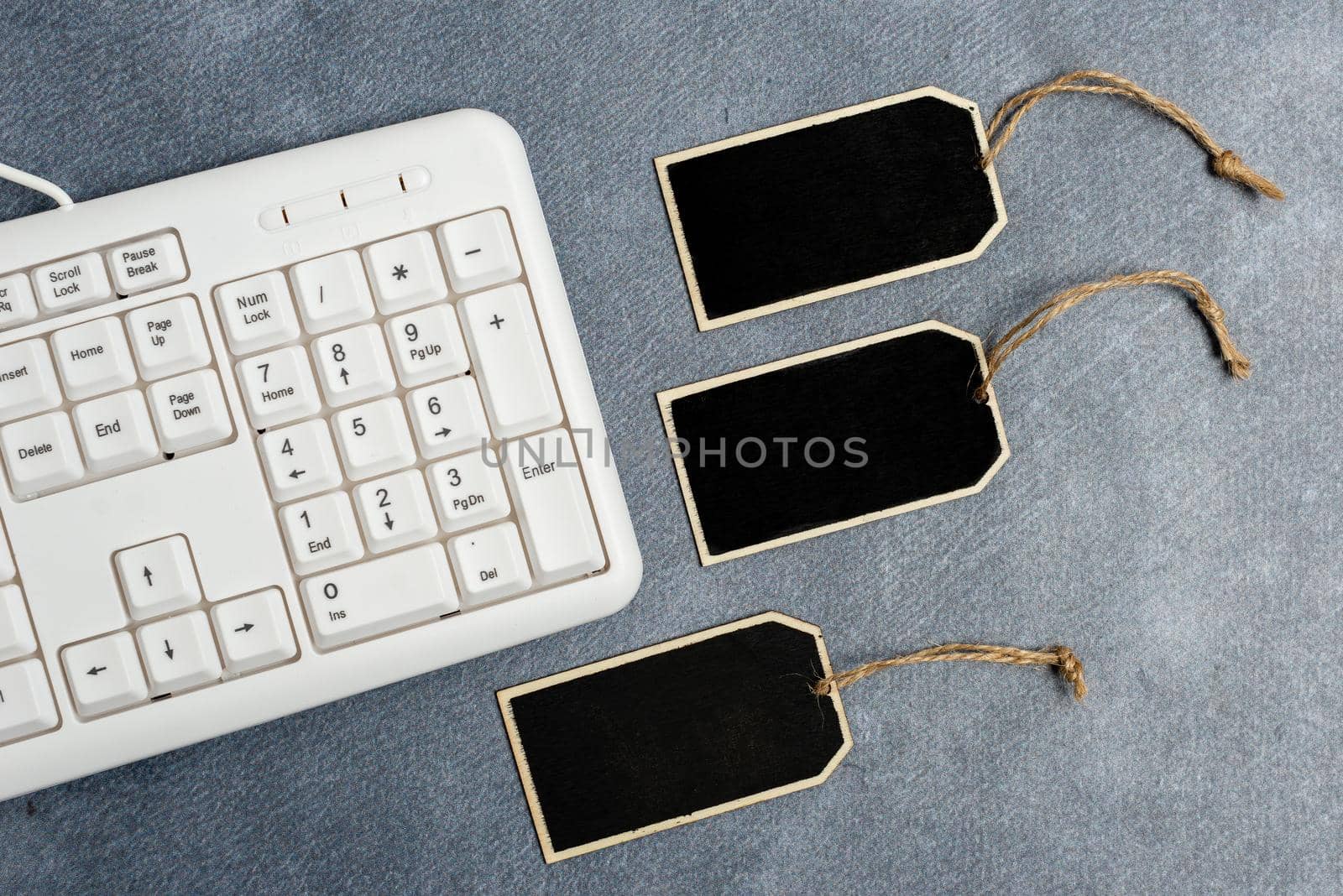 Collection of Blank Empty Sticker Tags Tied With A String For Information Label Sign