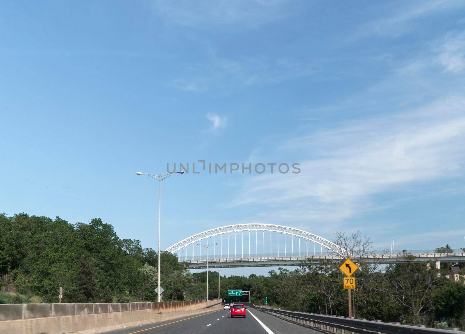 Crossing the road leading to Niagara Falls on the second level passes the Bridge with an arch