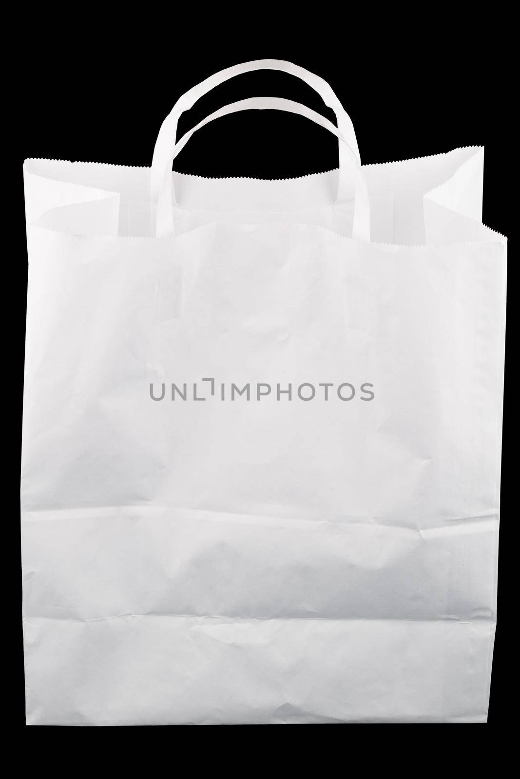 used white paper bag with handles isolated on black background.