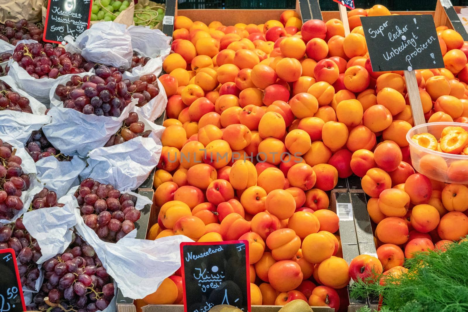 Mirabelle plums and grapes for sale at a market