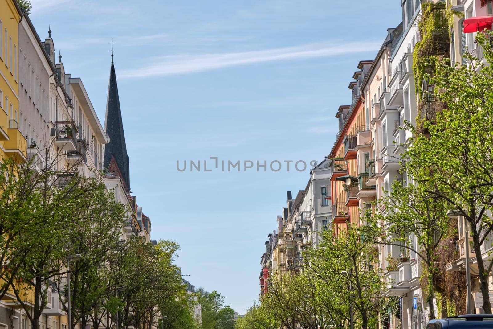 Street with renovated old apartment buildings seen in Prenzlauer Berg, Berlin