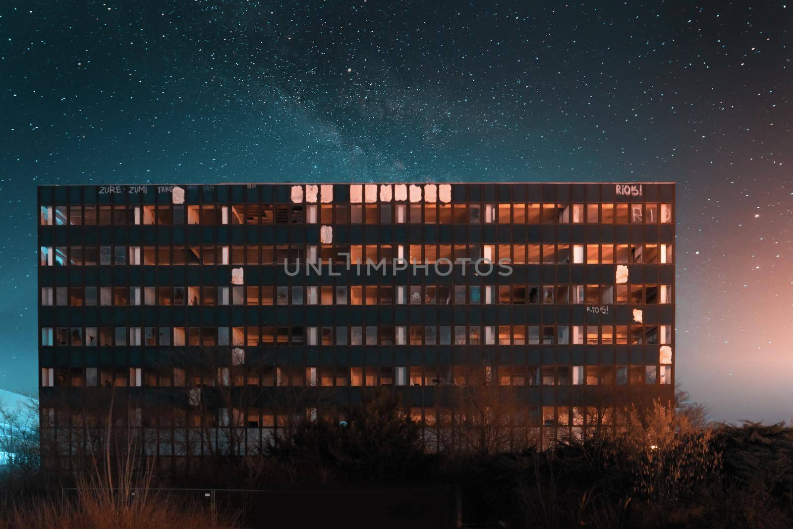 An old abandoned office building at night