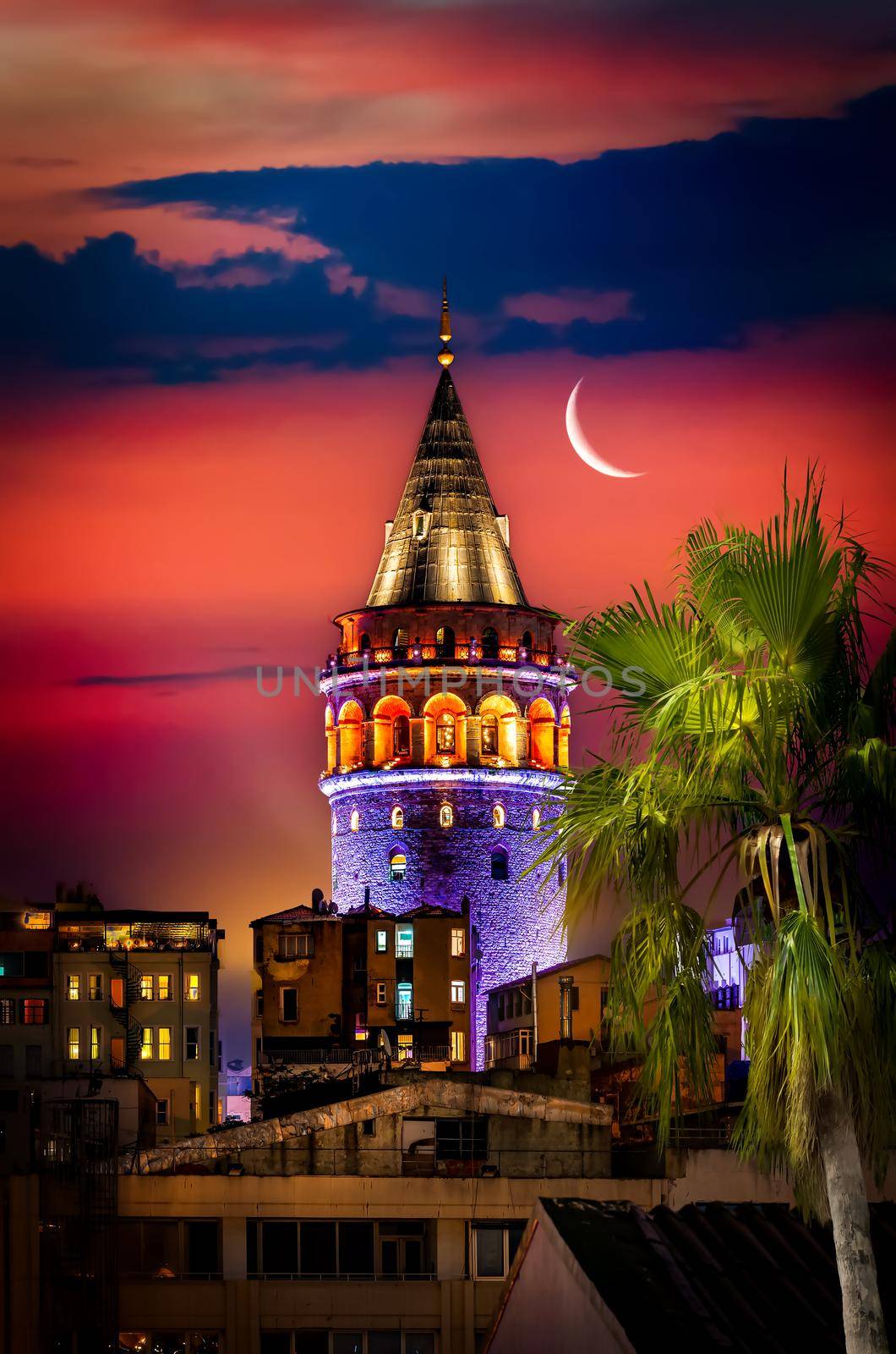 Illuminated Galata Tower in Istanbul at night, Turkey