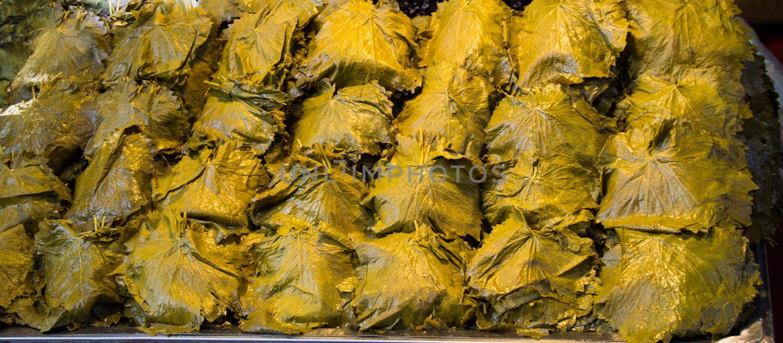 Grape vine leaves in a market as background for making vine leaves wrap by berkay