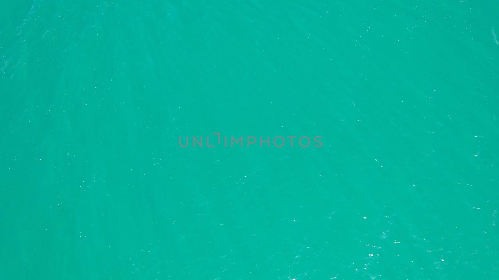 View of the green water. Water background. by Passcal