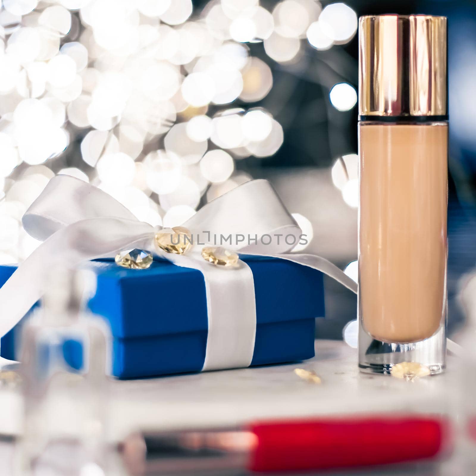 Holiday make-up foundation base, concealer and blue gift box, luxury cosmetics present and blank label products for beauty brand design by Anneleven