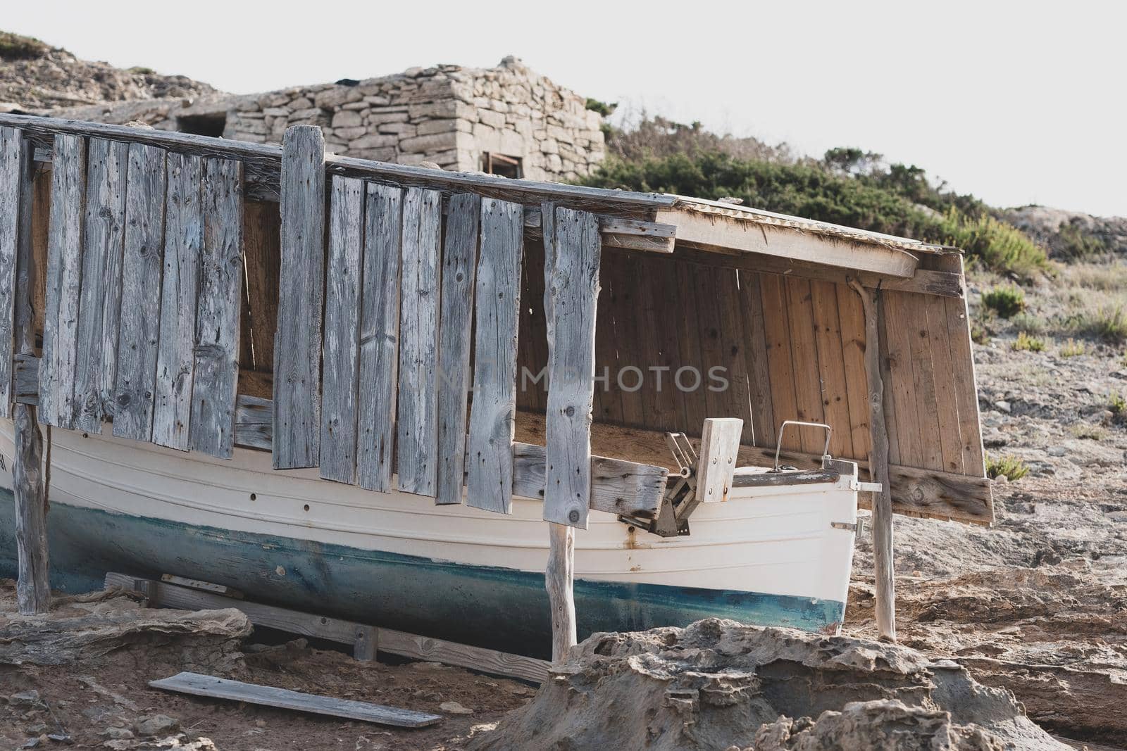 Fisherman's boat on the beach of Illetes in Formentera, Spain.