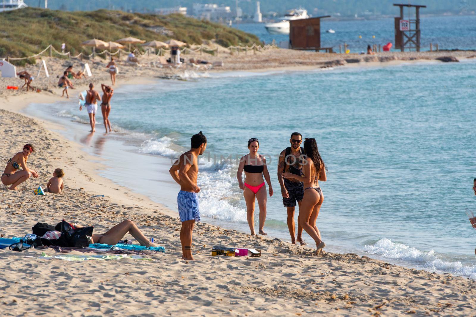 Formentera, Spain: 2021 June 13: Tourists enjoying the Illetes Beach in Formentera in Spain in times of Covid19