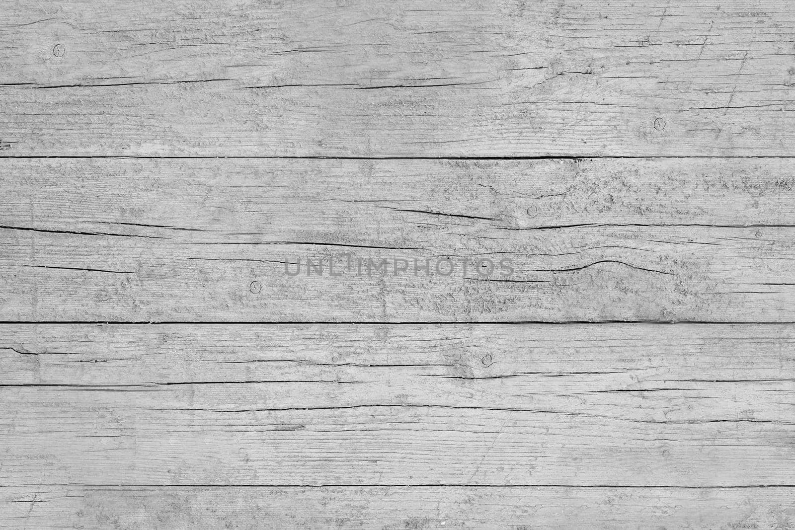 Background old wooden board of gray color with cracks on the surface