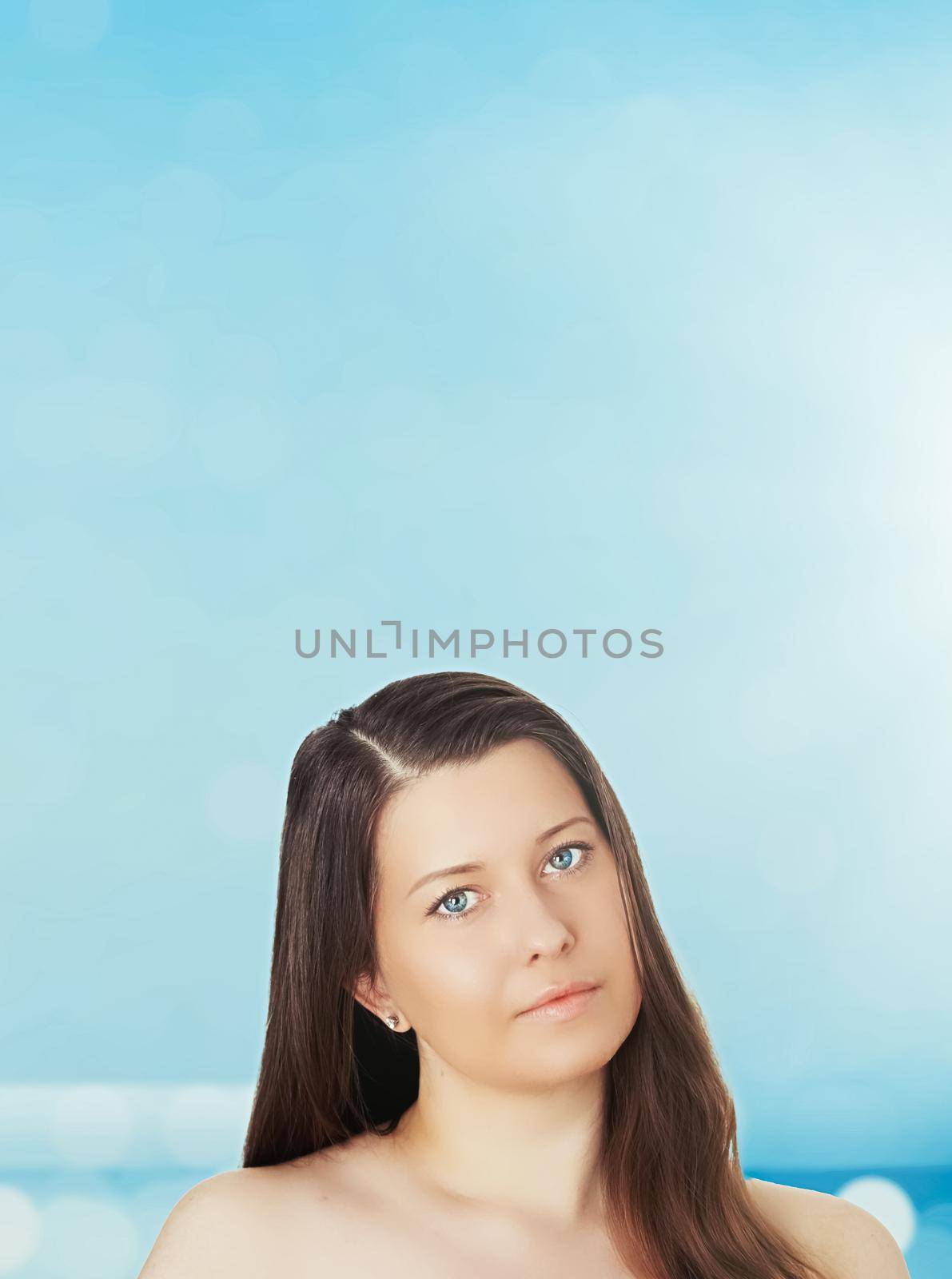 Skincare and sun protection in summer. Portrait of a beautiful young suntanned woman, blue sea and sky on background, beauty, wellness and travel concept by Anneleven