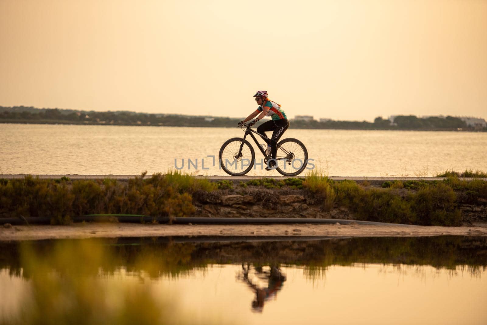 Formentera, Spain: 2021 June 14: People on Bicycle in the Ses Salines Natural Park in Formentera, Spain in Times of covid19.