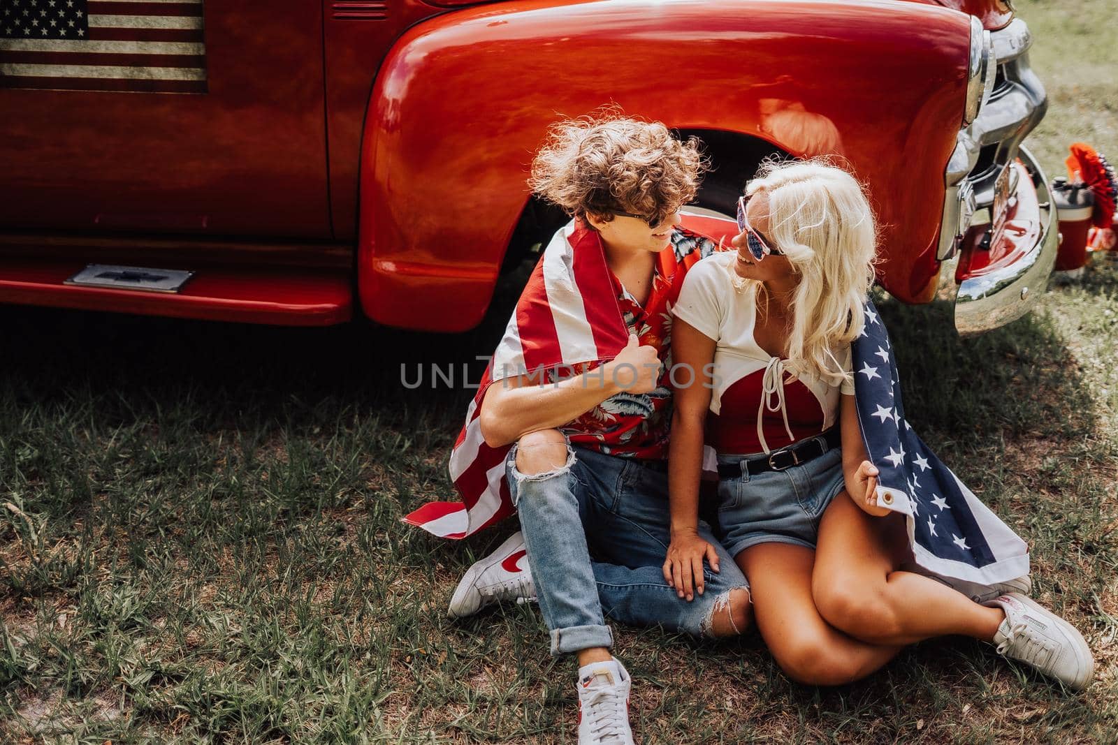 Couple in a vintage red truck