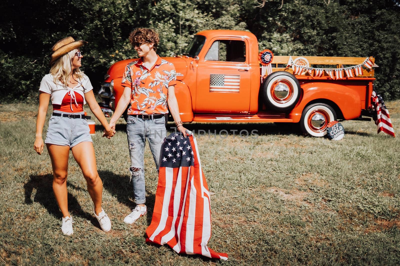 A couple with their vintage truck by castaldostudio