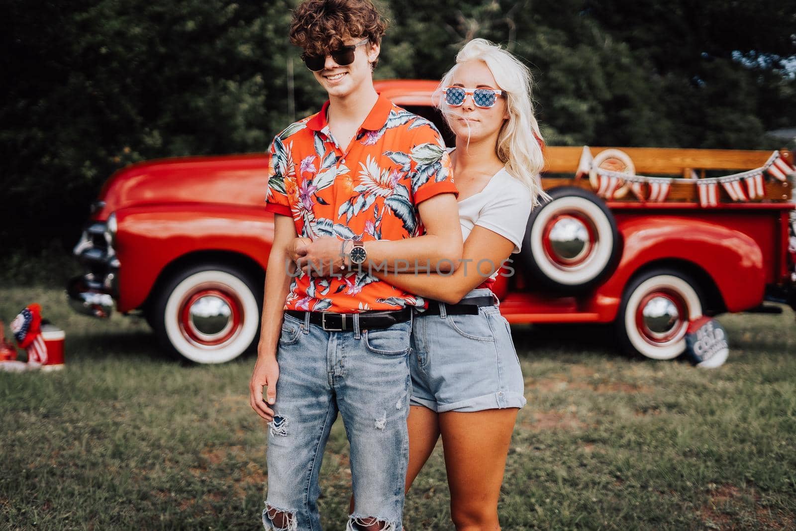 Couple in a vintage red truck