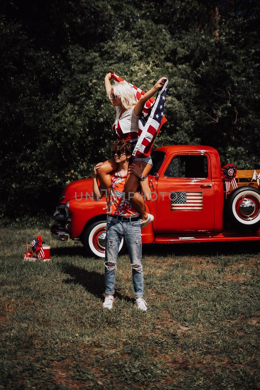 Couple in a vintage red truck