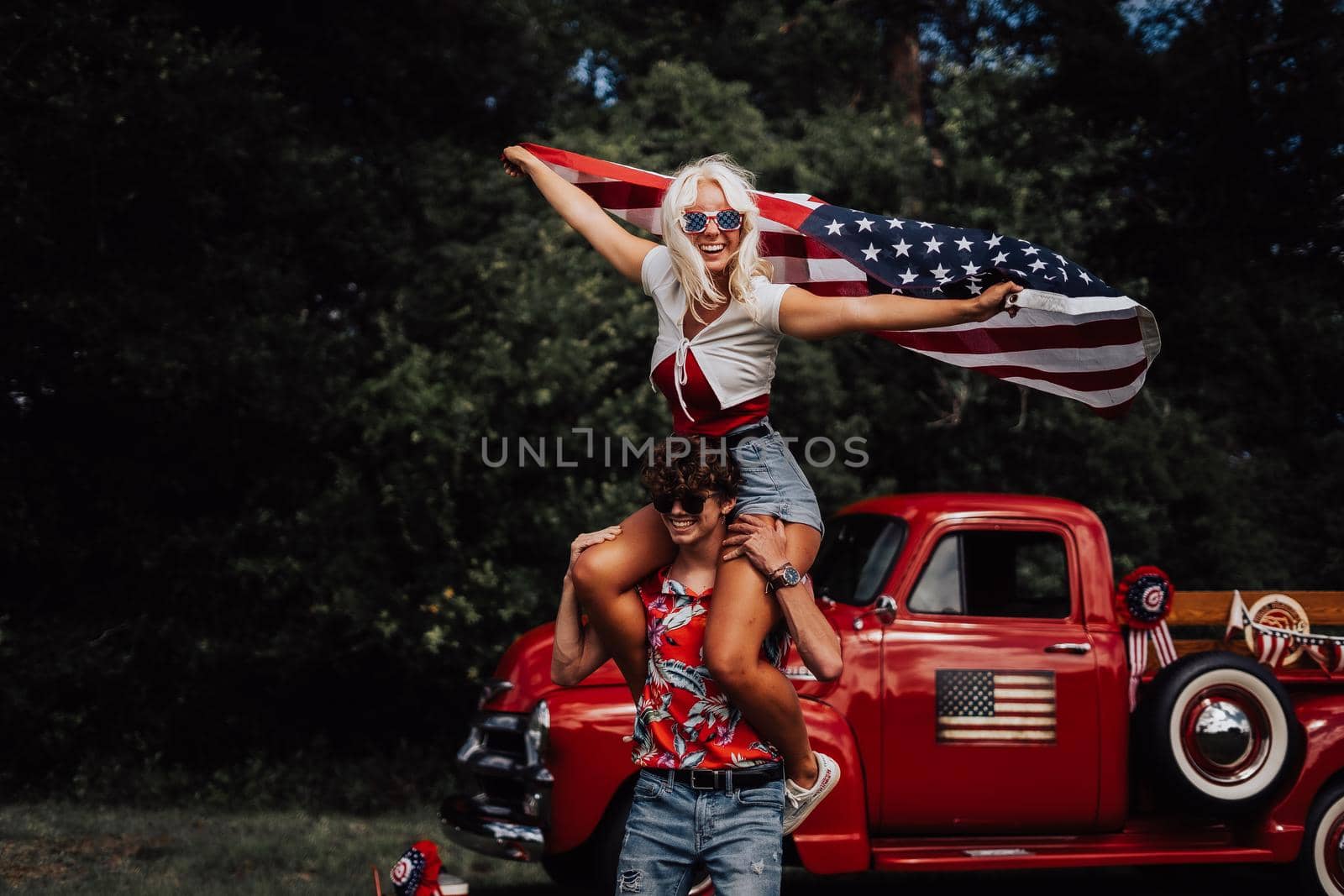 Couple in a vintage red truck