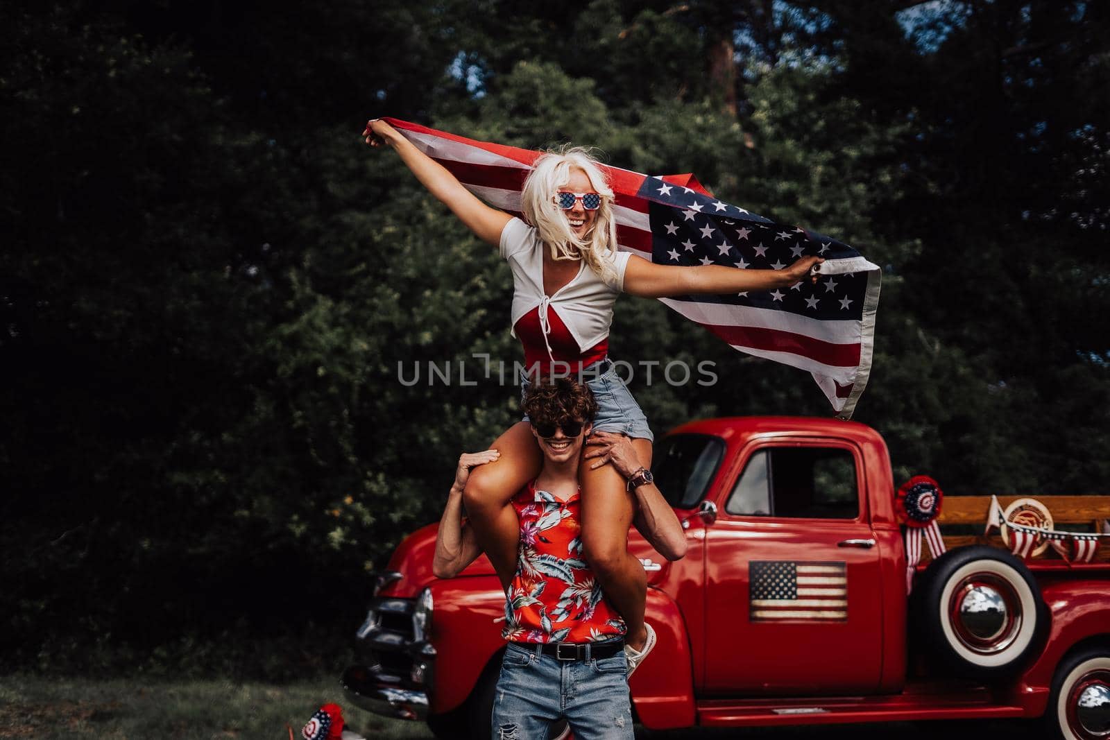 Couple in a vintage red truck