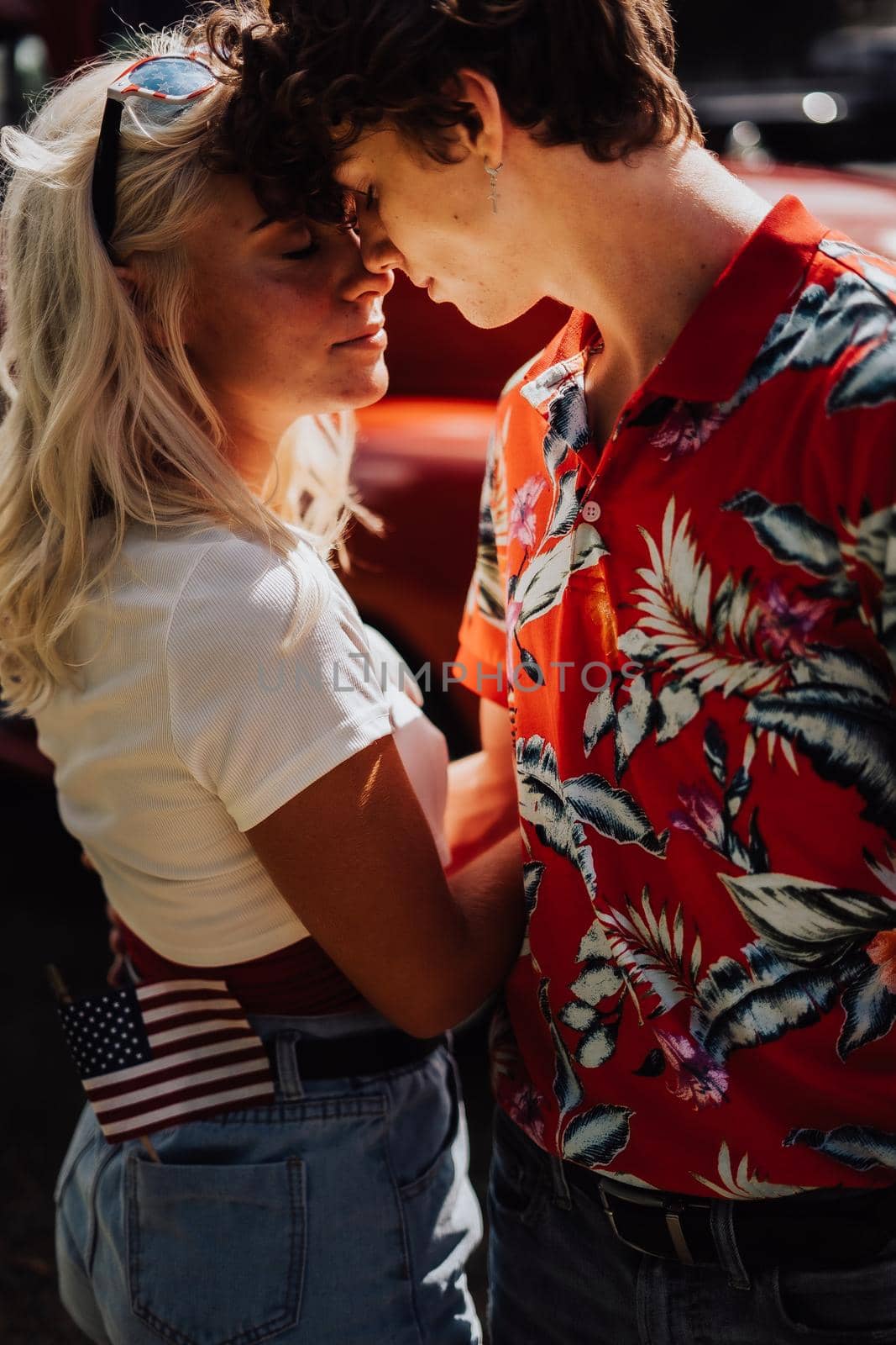 Couple in a vintage red truck