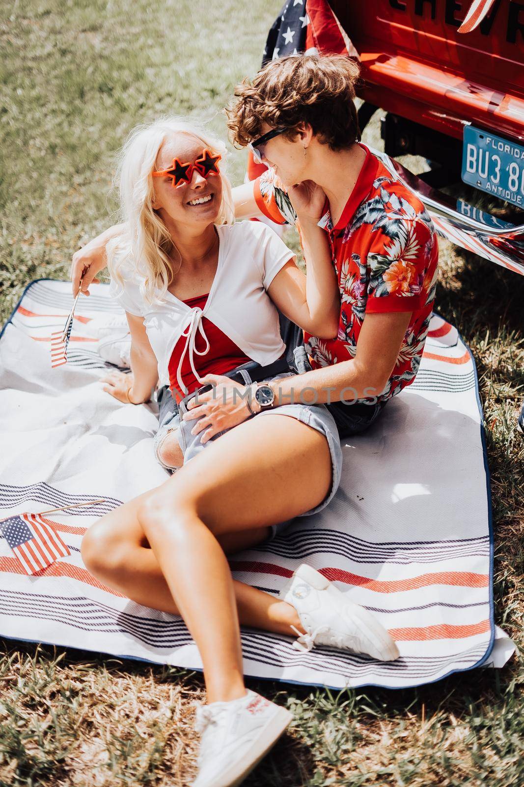 Couple in a vintage red truck