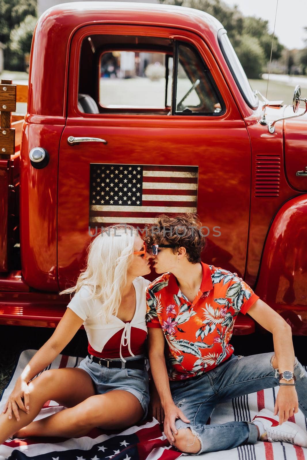A couple with their vintage truck by castaldostudio