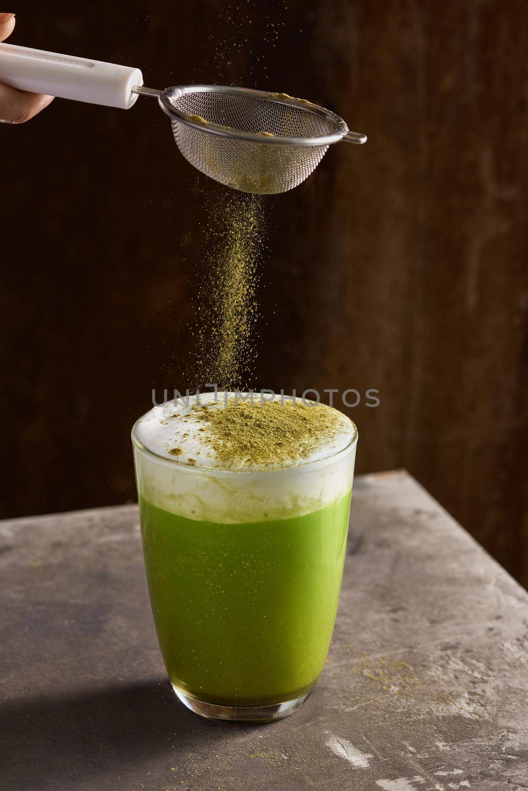 Matcha green tea latte in glass cup